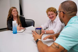 People Sitting Around a Table