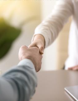 Two People Shaking Hands